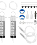 Two Pack Brake Bleeder Kit With One Hundred Ml Syringe And Precision Anti Backflow Valve For Smooth Hydraulic Fluid Extraction Quick Diy Garage Fixes Goes Down Smooth And Tight, includes two 100ml syringes and various components.