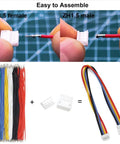 1.5mm JST Style Male And Female Connector Kit with 28 AWG Silicone Cables and heat shrink tubes shown with cables and housing