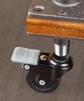 Swivel Caster Wheels For Three Quarter Inch Pipe Four Pack With Locking Mechanism installed on table leg