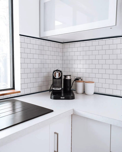Modern kitchen with Peel And Stick Backsplash Tile Edge Trim 10 Ft Self Adhesive Corner Liner In Black PVC Trim For No Fuss Easy DIY Install.
