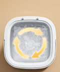 Close-up of Ultra Compact Foldable Portable Washing Machine with Two In One Wash And Dry Combo Function top view of spinning wash drum in action.