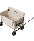 3-in-1 Collapsible Wagon With Wheels, Converts To A 75cm Wide Sofa, Heavy Duty 550lbs 220L Capacity, shown with handle extended