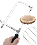 Badass Jeweler Toolkit Featuring Tough Saw Frame With 144 Cutting Blades; metal saw cutting through wood block.