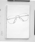 Sunglasses Repair Kit Quick Fix For Eyeglass Temples And Replacement Arms Spare Glasses Legs Durable DIY Repair Tools For A Secure Fit And Sleek Look, shown on a notebook with clips and a pencil.