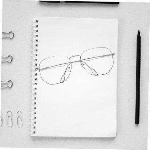 Sunglasses Repair Kit Quick Fix For Eyeglass Temples And Replacement Arms Spare Glasses Legs Durable DIY Repair Tools For A Secure Fit And Sleek Look, shown on a notebook with clips and a pencil.