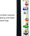 Close-up of Dope Desktop Weather Station With Galileo Thermometer And Fitzroy Storm Glass Predictor, matte black finish, five multicolor spheres.