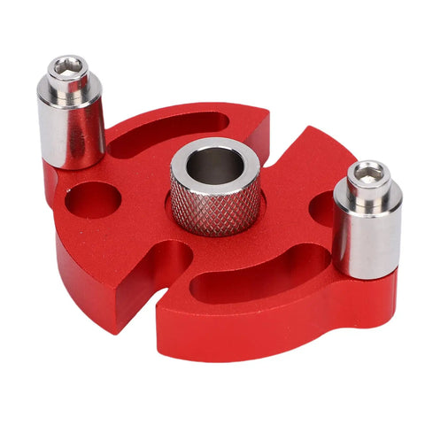 Self Centering Dowel Jig Kit With Solid Anodized Aluminum Block And Three Stainless Steel Bushings showing red aluminum block with stainless steel bushings.