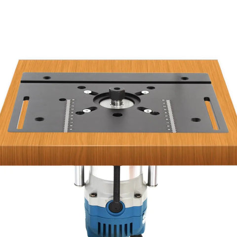 Premium Ironclad Aluminum Router Table Insert Plate on a wooden workbench, showing the smooth anodized surface for precision cuts.