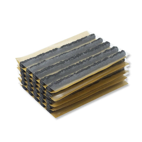 Heavy Duty 30 Piece Tire Repair Plugs For Tubeless Tires Ironclad Black Rubber Patch Strips stacked in packs.