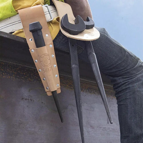 Workhorse Construction Spud Wrench With Tether Hole Made In USA 1-1/4 Inch Opening hanging from tool belt on worker's hip.
