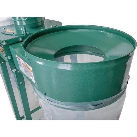 Shop Tough Five Horsepower Industrial Dust Collector Kicking Serious Dust With Giant Fifteen Inch Impeller and Four Quick Connect Ports top view of dust collector funnel.