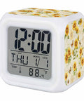 Totally Dope Digital Cube Alarm Clock With Super Responsive Silicone Buttons And A Sweet Seven Color Night Light showing date and temperature.