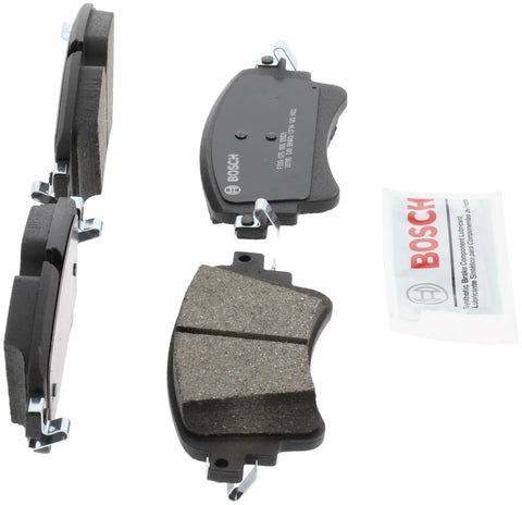 Bosch BC1898 QuietCast ceramic rear brake pads for Audi; front and side views with lubricant packet.