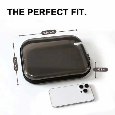 Large Translucent Dark Brown Hard Shell Zipper Case Featuring Hella Tough Drop Protection And Straight Up Scratch Resistance For Your Everyday Electronics With A Chill Clear Finish next to a smartphone for size comparison.
