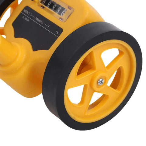Close-up of NDNCZDHC Rolling Measuring Wheel, 4 Inch Distance Measure Tool 0-9999.9m, featuring yellow wheel design.