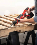 Top Shelf 20 Volt Compact Reciprocating Saw Kit With 2.0 Ah Pwrcore Lithium Battery And Rapid Charger Boss Level Cuts Through Metal PVC Masonry At 3000 Spm Cordless Demolition Power Tool cutting wood pallets.