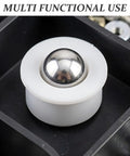 Close-up of a 12pcs Steel Ball Transfer Casters with Nylon Housing, 0.7x0.5in, showing a shiny ball in white housing for furniture use.