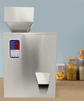Automatic Granule Filling Machine Features Stainless Steel Housing For Hella Precise Digital Weighing Up To Five Hundred Grams.