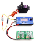 2Pcs Servo Signal Reverser Inverter For PWM Control 3.6V To 24V with servo motor, tester, and battery pack