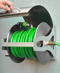 Solid Retractable Hose Cart With Weatherproof Roll Cover Wall Mounted Stainless Steel Yard Watering And Car Wash Reel smooth glide design with green hose.