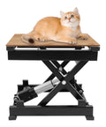 Heavy Duty Electric Scissor Lift Table With No Sweat 130 Lbs Raising Action Smooth Height Adjust From 7 To 16 Inches with cat on wooden top.