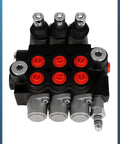 Three-spool hydraulic flow control valve with red port plugs, black body, and silver fittings