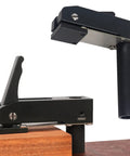 Rock Solid 3/4 Inch MFT Bench Holdfast Woodworking Clamp Aluminum Alloy shown in use on wood for routing and sanding tasks.