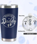 Blue insulated tumbler with 'Promoted to Daddy' design, featuring a straw lid and outlined straw holes. Celebrate The Freshly Minted Arrival Of New Mama And Papa With This Awesome Gift Set For Couples Featuring Matching Tumblers Paired With A Warm Cozy Candle Perfect For Baby Showers First Fathers Day And Parenting Squad Celebrations.