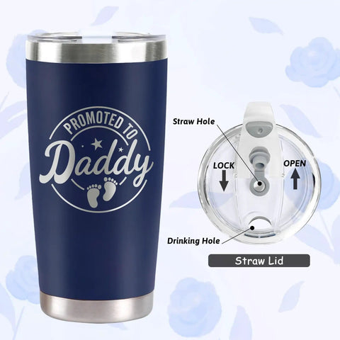 Blue insulated tumbler with 'Promoted to Daddy' design, featuring a straw lid and outlined straw holes. Celebrate The Freshly Minted Arrival Of New Mama And Papa With This Awesome Gift Set For Couples Featuring Matching Tumblers Paired With A Warm Cozy Candle Perfect For Baby Showers First Fathers Day And Parenting Squad Celebrations.