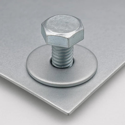 Close-up of 1/4 in x 1-1/4 in stainless steel fender washer with bolt on silver metal plate