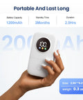 Slick Mini Bluetooth Label Maker With Five Colorful Tapes And Smart LED Display For Quick Organizing Grab And Go Portable Printer held in hand.