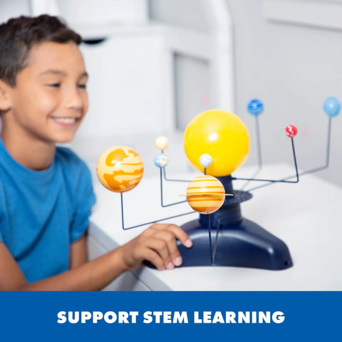 Motorized Solar System Model for Kids With Realistic Orbits, Hands On STEM Learning Toy for Exploring Planets and the Sun at Different Speeds, Interactive Space Educational Kit for Young Astronomers, boy using plastic solar system model