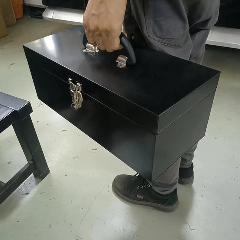 Person holding Portable 16 Inch Metal Toolbox With Heavy Duty 18 Gauge Steel Construction Black Large Tool Box Drawer Organizer
