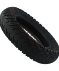 10 Inch Tubeless Scooter Tire 10x2.50 60-85-6 Off Road Replacement, black rubber tire with rugged tread design, angled view.