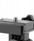Close-up of black Latitude Base Mount for Star Adventurer Wedge Base with dual knobs and tilt adjustment mechanism, aluminum alloy.