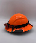 Image of an orange full brim hard hat with hard hat clips for Lift Brand Helmets, patent pending, front back size options, USA made, easy install.