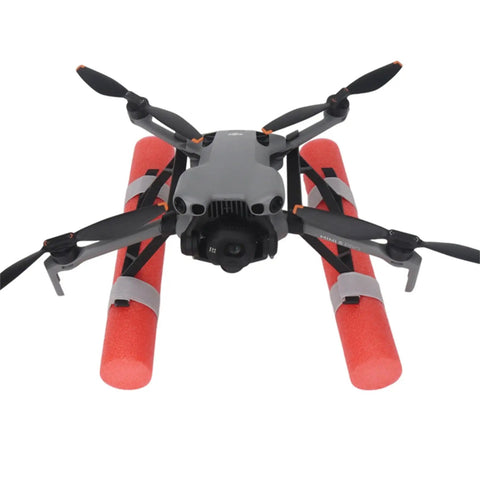 DJI Mini 5 Pro with red water landing gear, featuring floating skid buoyancy rod kit for drone water training and takeoffs.