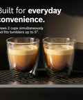 Two cups of espresso brewed by a fully automatic coffee and espresso machine for home use with 35 drink menu.