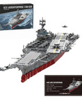 Top Shelf USS Enterprise CVN 65 Aircraft Carrier Building Blocks Set With 4941 Heavy Duty Bricks And 1 350 Scale Military Ship Model displayed next to its box.