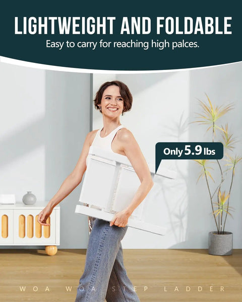 Sturdy 2 Step Ladder With 17 Inch Top Step, 300 Lb Capacity, White Finish, Wider 7.9 Inch Treads For Comfort And Stability, Great For Home, Garage, And DIY Tasks. Woman carrying a white foldable 2-step ladder indoors