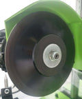 Close-up of Slick CNC Circular Saw Blade Sharpener With Smart Touchscreen, featuring a grinding wheel for precise blade sharpening.