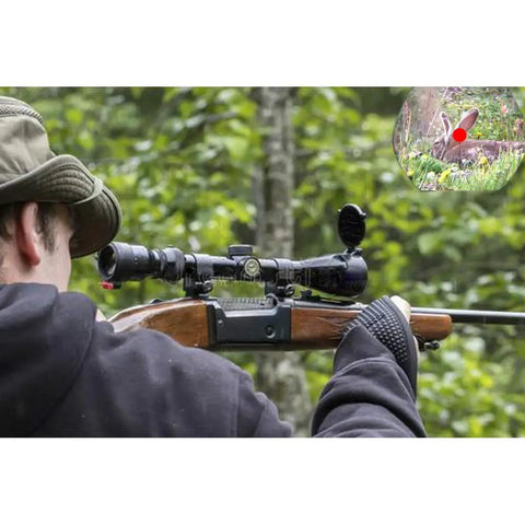 Hunter aiming with Red Dot Laser Bore Sight For Shotgun In-Chamber Cartridge With Two Battery Sets, visible red laser dot.