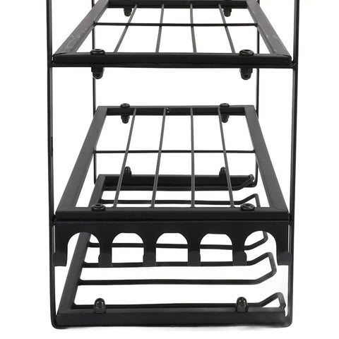Close-up view of Badass Heavy Duty Wall Mounted Power Tool Organizer Rock Solid Drill Holder showing metal racks and hooks for tool storage.