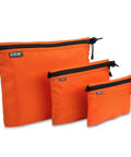 Three Pack Travel Toiletry Bags for Men Carry-On Organizer Pouch Set Zippered Cosmetic and Electronics Pouches Durable Nylon Ripstop Water-Repellent in Orange