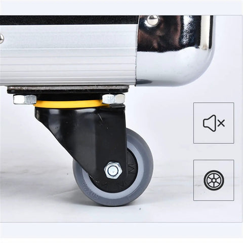 Close-up of a wheel on a Rolling Toolbox On Wheels For Home Garage And Workshop, Portable Tool Case With Telescoping Handle, Removable Bulkhead Organizer