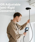 Man using Dual Lens 210 Degree Articulating Endoscope With 4.5 Inch Screen 10 Foot Flexible Borescope Camera for ceiling inspection