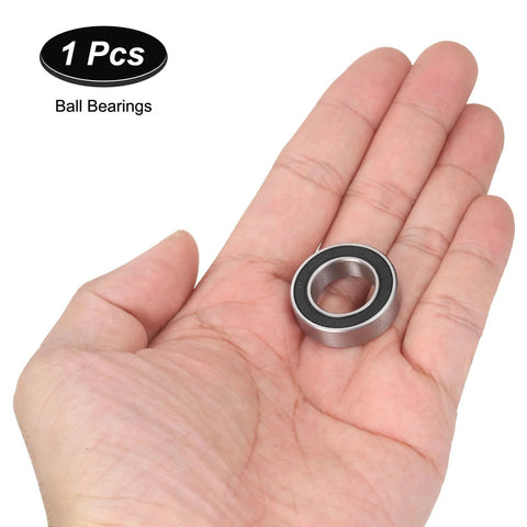 Ceramic hybrid ball bearing, 15x26x7 mm (Si3N4), double-sealed, held in hand.