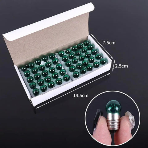 Light Up Your Workspace With Top Tier Green Mini Screw Base Bulbs Designed For STEM Labs And Hobby Workshops Providing Reliable 2.5V Low Voltage Power That Really Pumps Out Steady Illumination in a box of green bulbs.