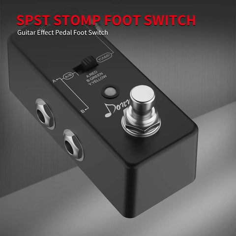 Side view of black guitar effects pedal with foot switch, sleek design, labeled inputs, and pedal button for 13 Piece SPST Momentary Soft Touch Foot Switch For Guitar Effects Pedals Normally Open 2 Pin Stomp Box Push Button Footswitch Silent No Click Durable Solder Lug Mount 12mm Hole Easy Press Great For Your Pedal Board