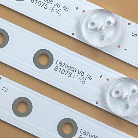 Close-up of 12 Pack LED Backlight Strips For TV LB70006 E70 E3 Replacement Kit, showing LED sections and model number.